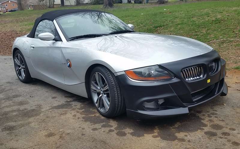 03 E85 with new Reiger front bumper sitting on car for comparison